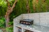 Barbacoa de esta casa de madera en Alhaurín de la Torre