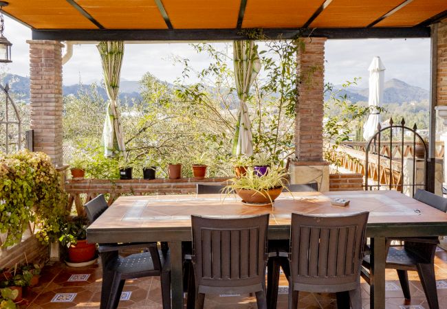 Terraza de esta Finca en Coín 