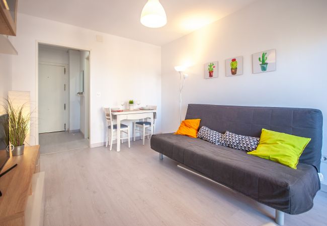 Salón comedor de este apartamento en Benalmádena