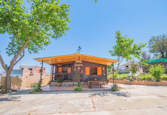 Terraza de esta casa de madera en Alhaurín el Grande