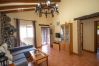 Living room with fireplace of this farm in Alhaurín el Grande