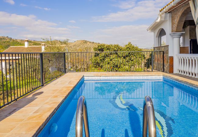 Private pool of this Finca in Coín