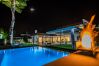 Private swimming pool at night of the luxury villa Elena in Alhaurín el Grande, Málaga